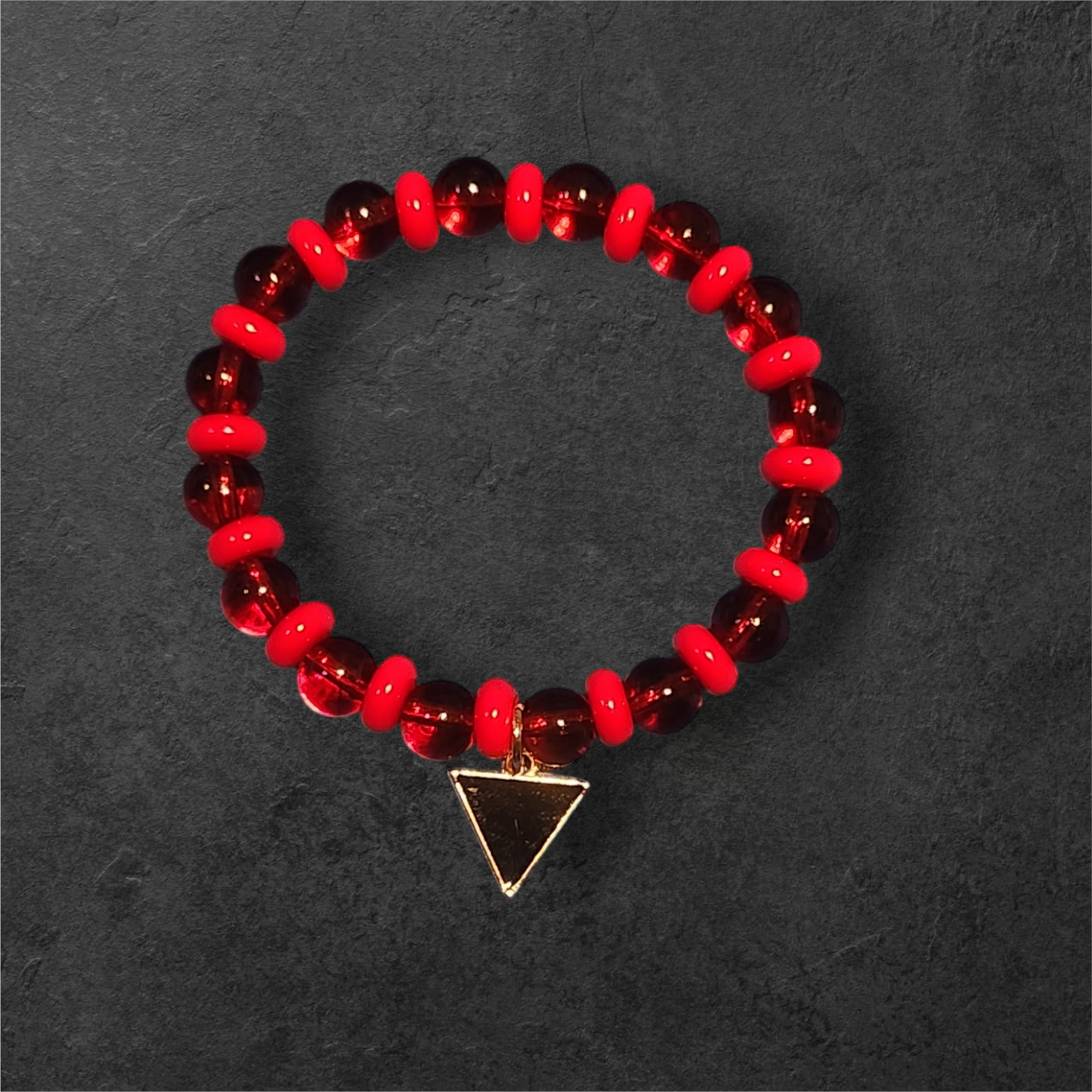 Red Bead Stretch Bracelet w/Black Triangle Charm